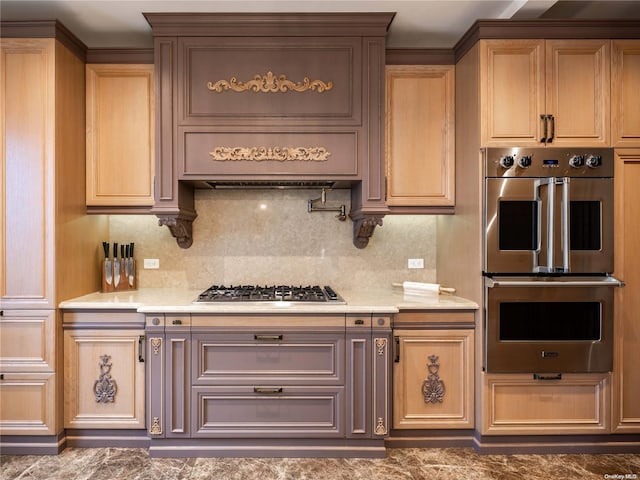 kitchen featuring tasteful backsplash and stainless steel appliances