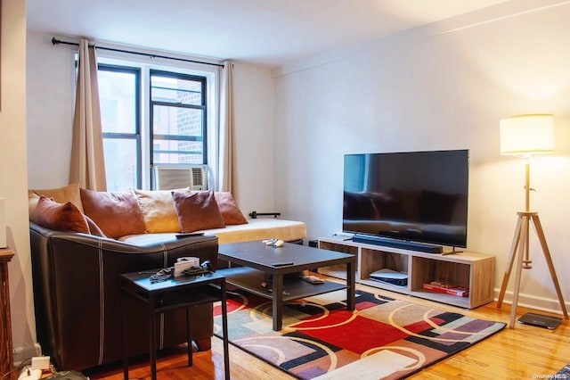 living room featuring hardwood / wood-style floors and cooling unit