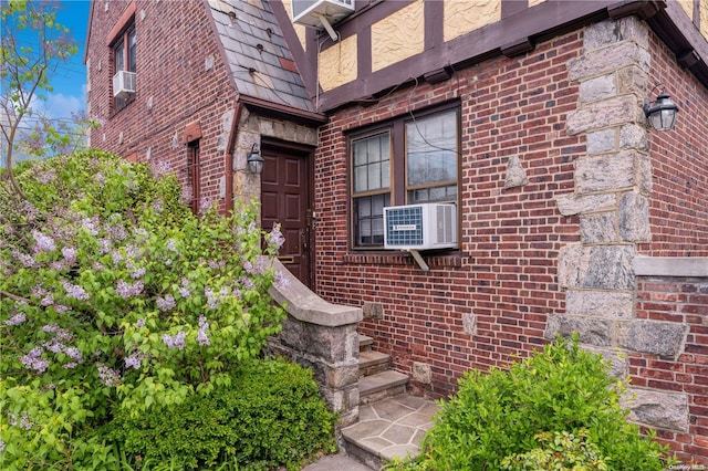 property entrance featuring cooling unit