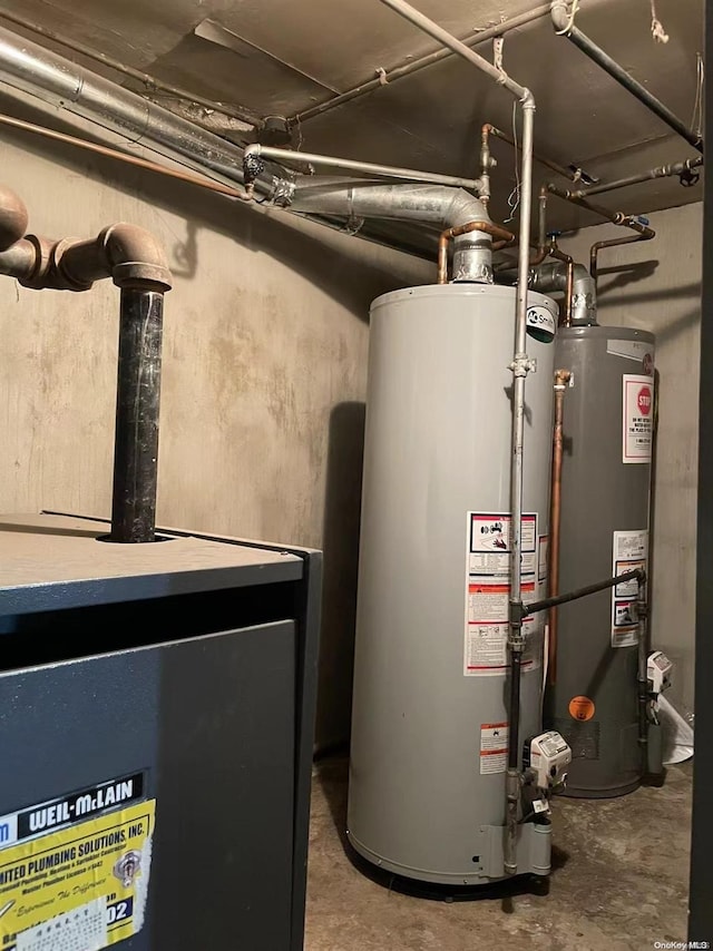 utility room featuring gas water heater