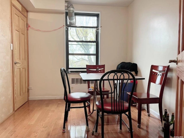 dining room with light hardwood / wood-style flooring