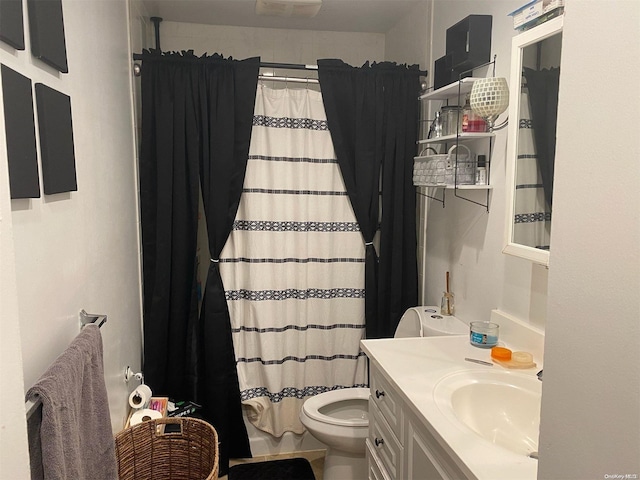 bathroom with vanity, toilet, and a shower with shower curtain