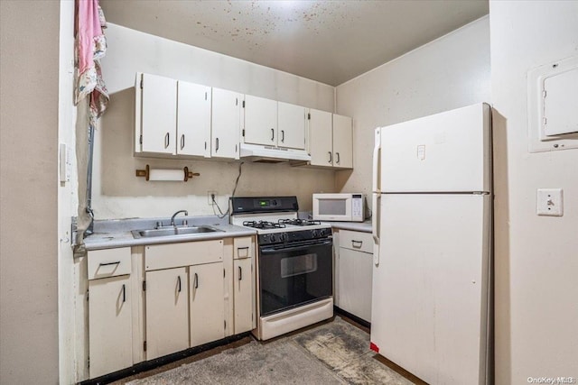 kitchen featuring white cabinetry, sink, and white appliances