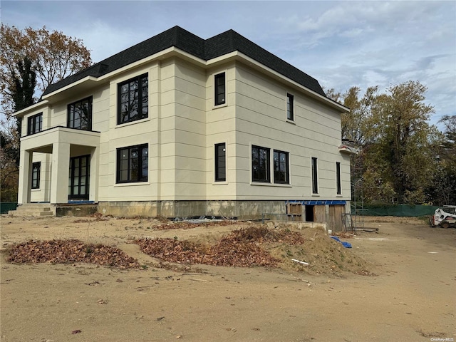 exterior space with a balcony