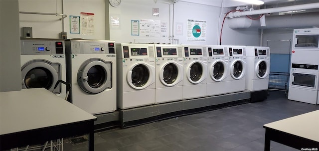 clothes washing area featuring washer and clothes dryer and stacked washer / dryer