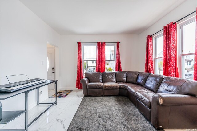 living room featuring a healthy amount of sunlight