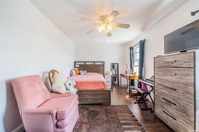 bedroom featuring dark hardwood / wood-style flooring and ceiling fan