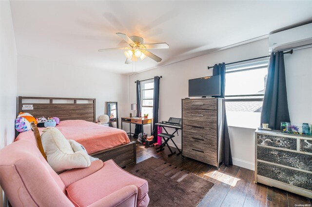 bedroom with ceiling fan and dark wood-type flooring