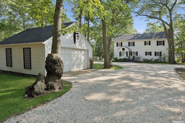 view of side of home with a garage