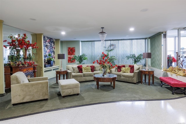 living room featuring an inviting chandelier