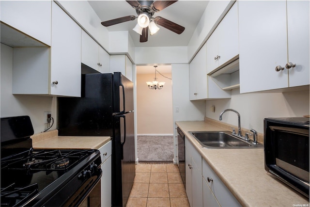 kitchen featuring black appliances, ceiling fan with notable chandelier, sink, light tile patterned flooring, and white cabinetry