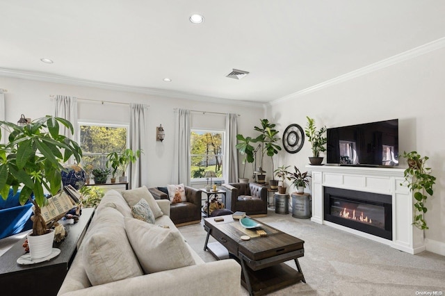 living room featuring crown molding and light carpet