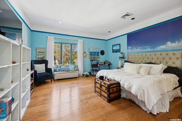 bedroom featuring light wood-type flooring