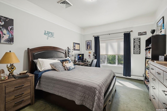 carpeted bedroom with a baseboard radiator