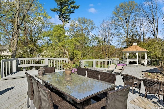 wooden terrace with a gazebo