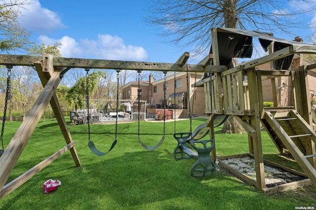 view of jungle gym with a lawn