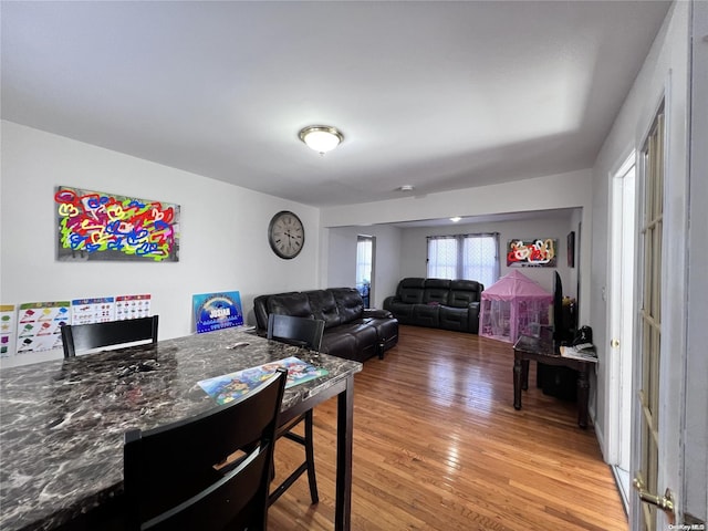 dining space featuring hardwood / wood-style flooring