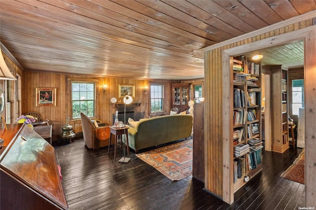 living room with wooden walls, wooden ceiling, and dark wood-type flooring