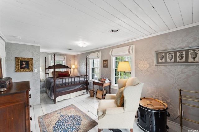 bedroom featuring crown molding, light hardwood / wood-style flooring, and wood ceiling