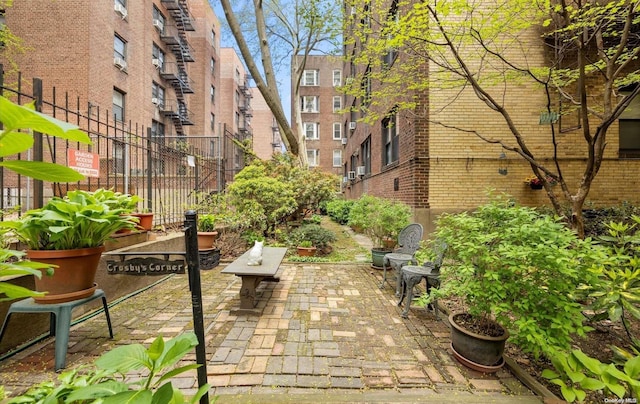 view of property's community featuring a patio