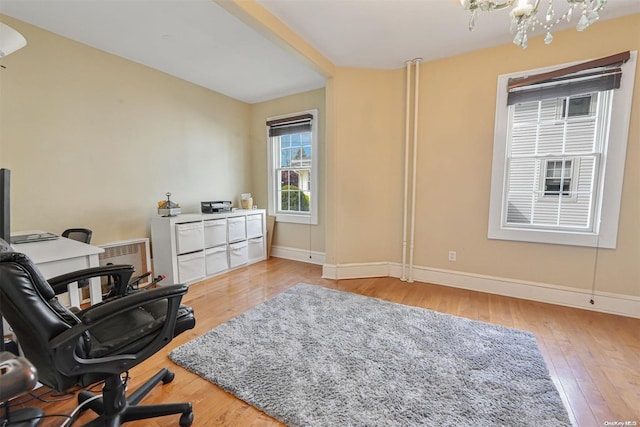 home office featuring light hardwood / wood-style flooring