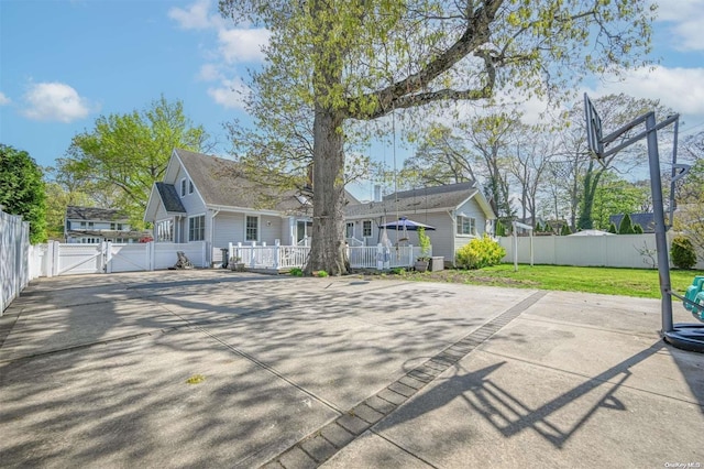 rear view of property with a yard