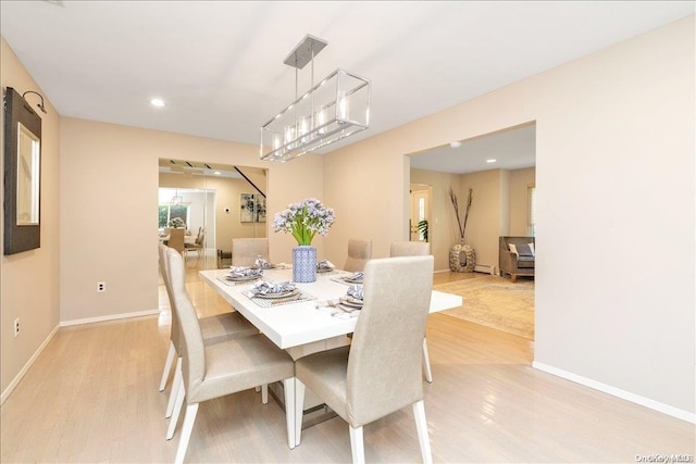 dining room featuring light hardwood / wood-style floors