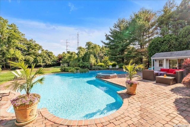 view of swimming pool featuring an outdoor structure, a patio area, an outdoor hangout area, and an in ground hot tub