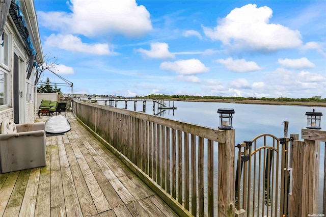 view of dock with a water view