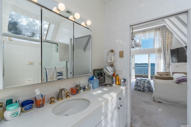 bathroom with vanity and concrete flooring