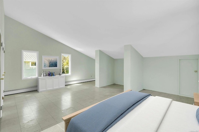 tiled bedroom featuring baseboard heating and vaulted ceiling