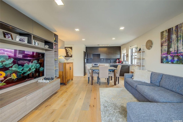 living room with light hardwood / wood-style floors