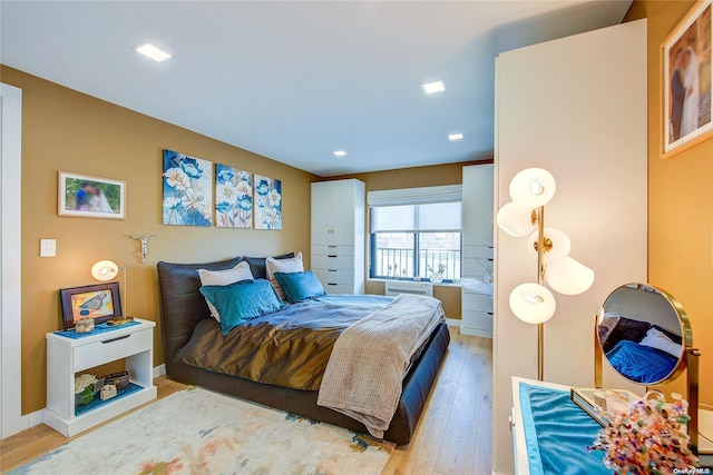 bedroom featuring wood-type flooring