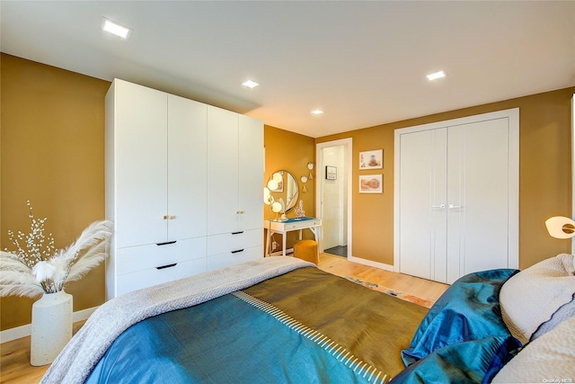 bedroom with light wood-type flooring