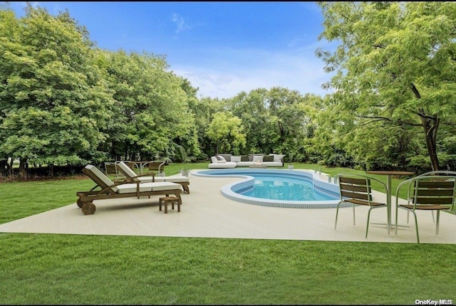 view of pool featuring an outdoor hangout area, a patio area, and a lawn