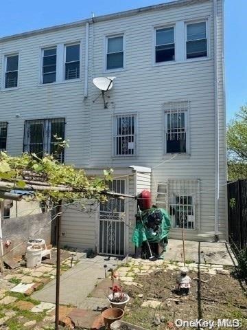 back of property with a patio area