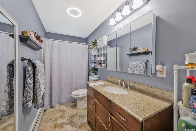 bathroom featuring vanity, toilet, and a shower with shower curtain