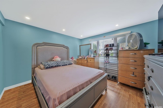 bedroom featuring light hardwood / wood-style floors