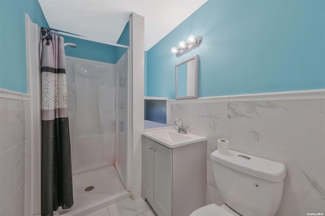 bathroom featuring vanity, a shower with curtain, tile walls, and toilet