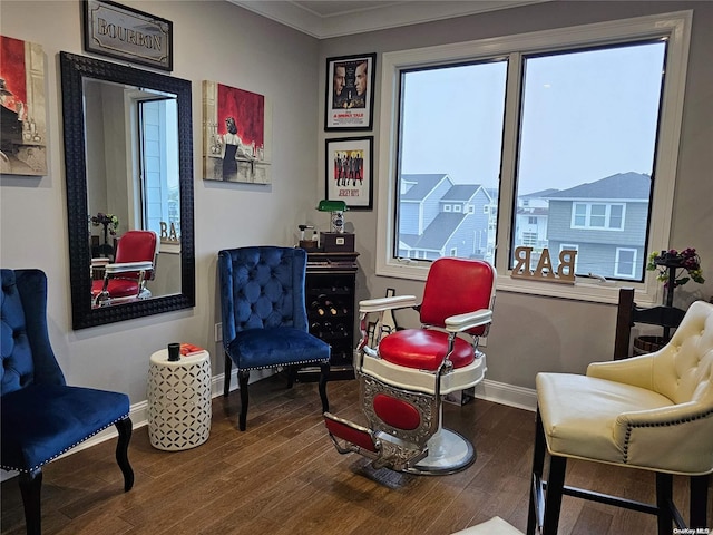 47 Pershing Ave, Babylon, NY 11702 - sitting room featuring baseboards, wood finished floors, and crown molding
