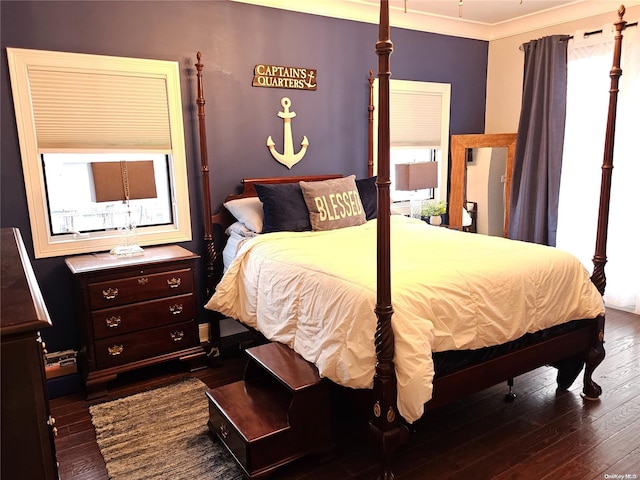 47 Pershing Ave, Babylon, NY 11702 - bedroom with dark wood finished floors and ornamental molding