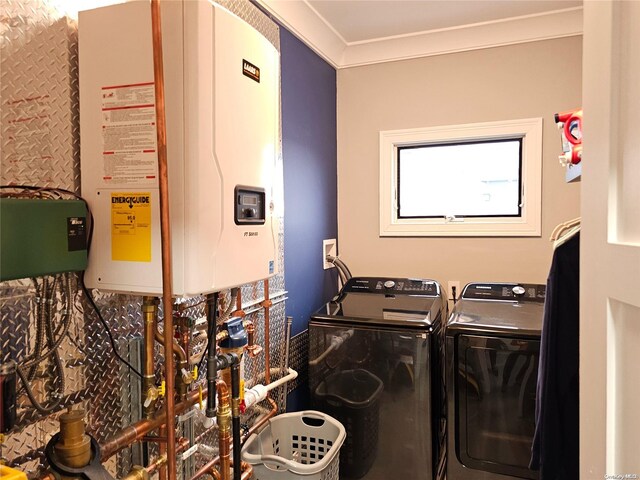 47 Pershing Ave, Babylon, NY 11702 - washroom featuring water heater, separate washer and dryer, and ornamental molding