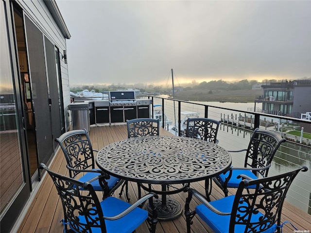 47 Pershing Ave, Babylon, NY 11702 - balcony featuring outdoor dining area and a grill