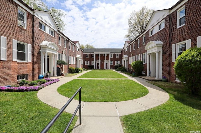 view of community featuring a yard