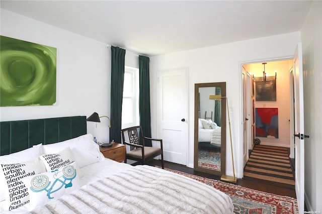 bedroom featuring dark hardwood / wood-style floors