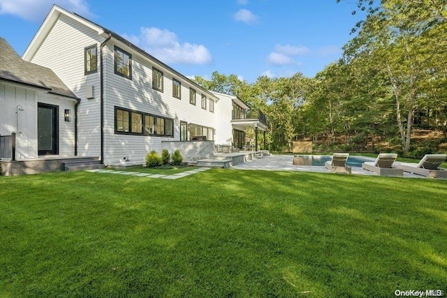 exterior space featuring a patio area and a yard