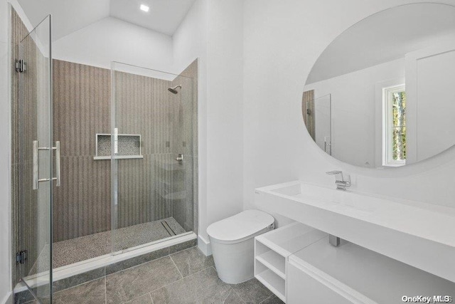 bathroom featuring tile patterned flooring, vanity, toilet, and walk in shower