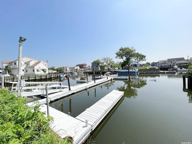 view of dock with a water view