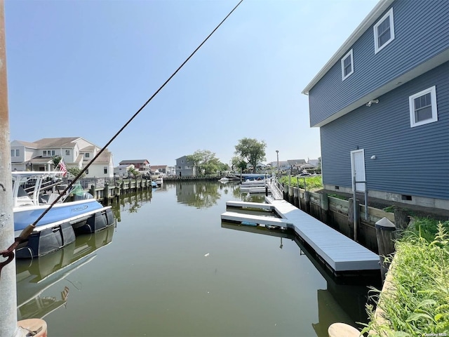 dock area with a water view