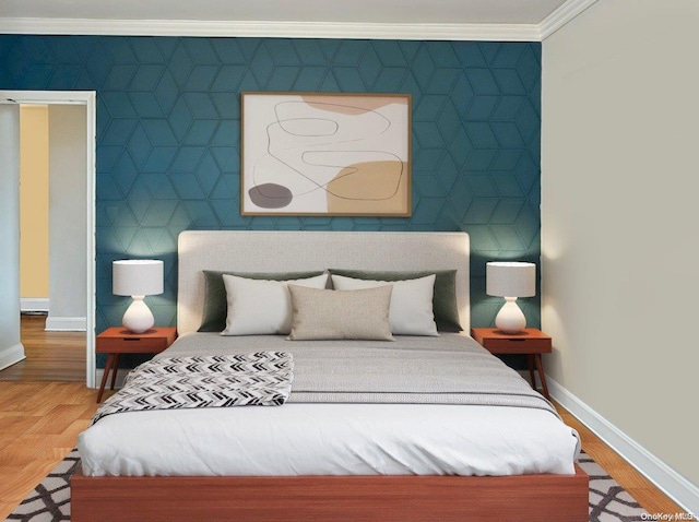 bedroom with wood-type flooring and crown molding